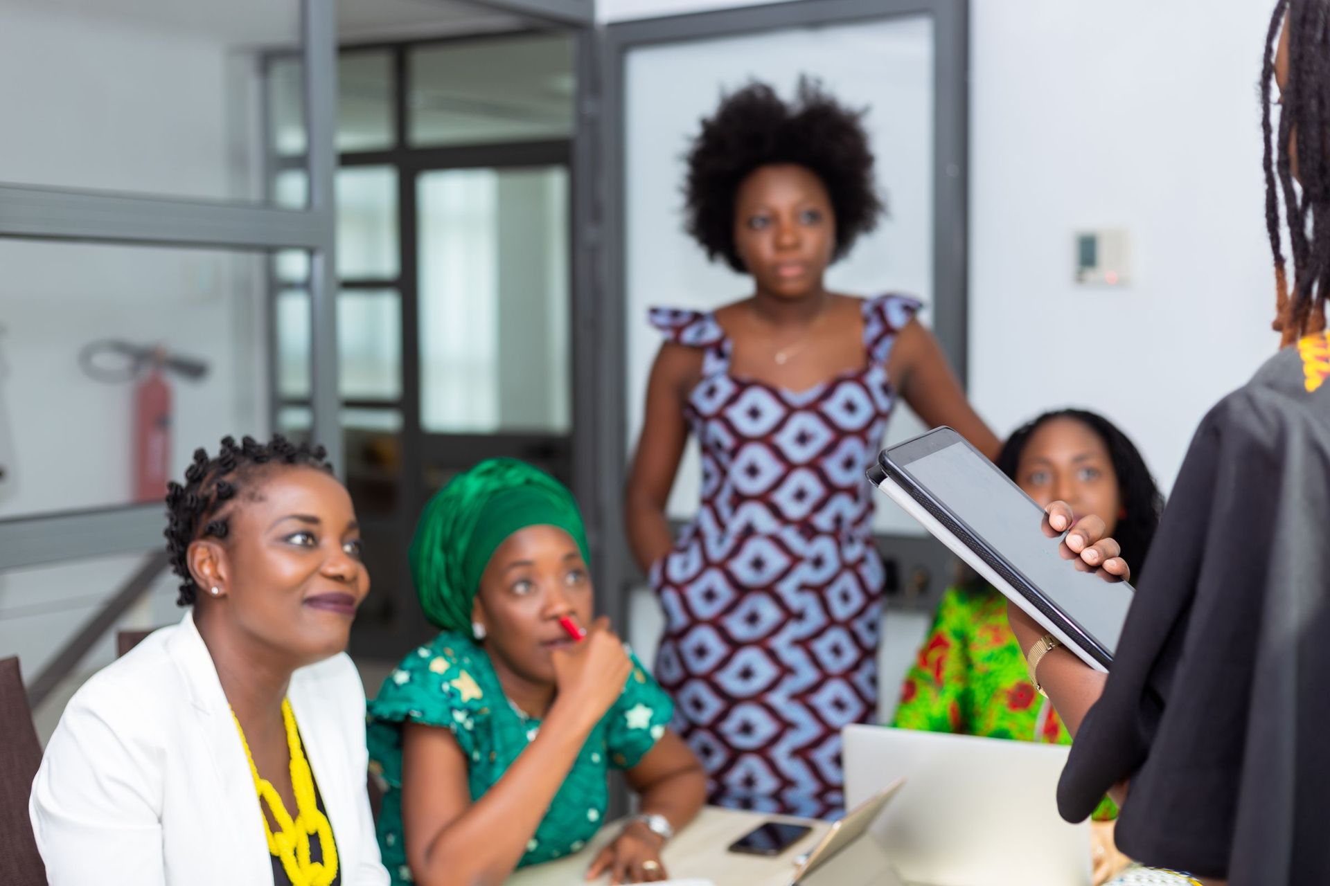 Team reviewing work together in a meeting